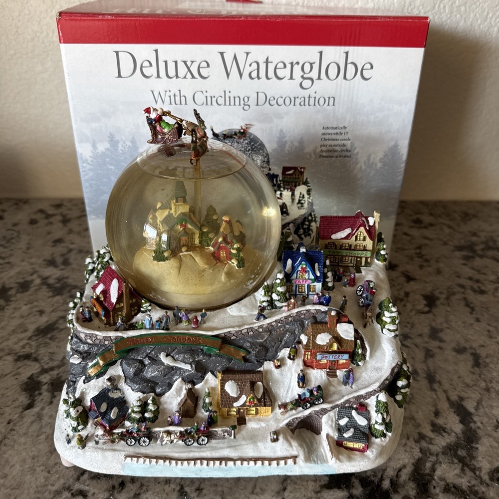Mr Christmas Holiday Snow Globe Musical Water Globe With Circling Decoration.